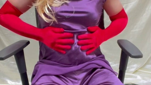 Purple satin blouse, pants and long red gloves