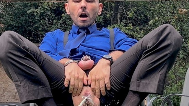 Suited Man With Locked Dick Is Playing With His Man Cunt And Pissing In Public In Sheer Socks