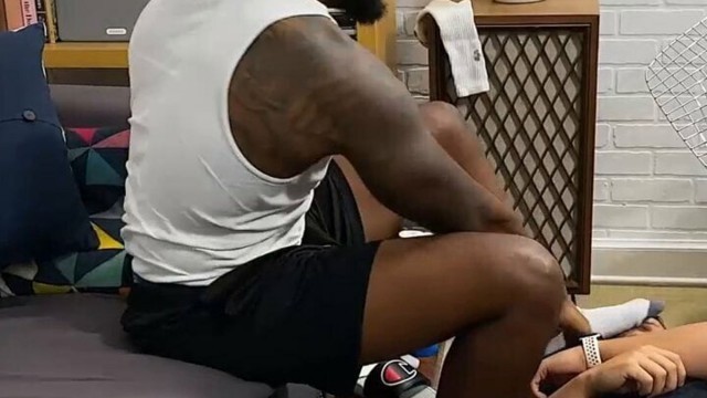 Athletic black hunk uses feet to dominate submissive amateur